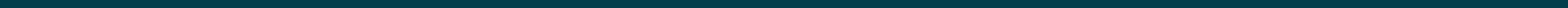 Solid dark teal color background.